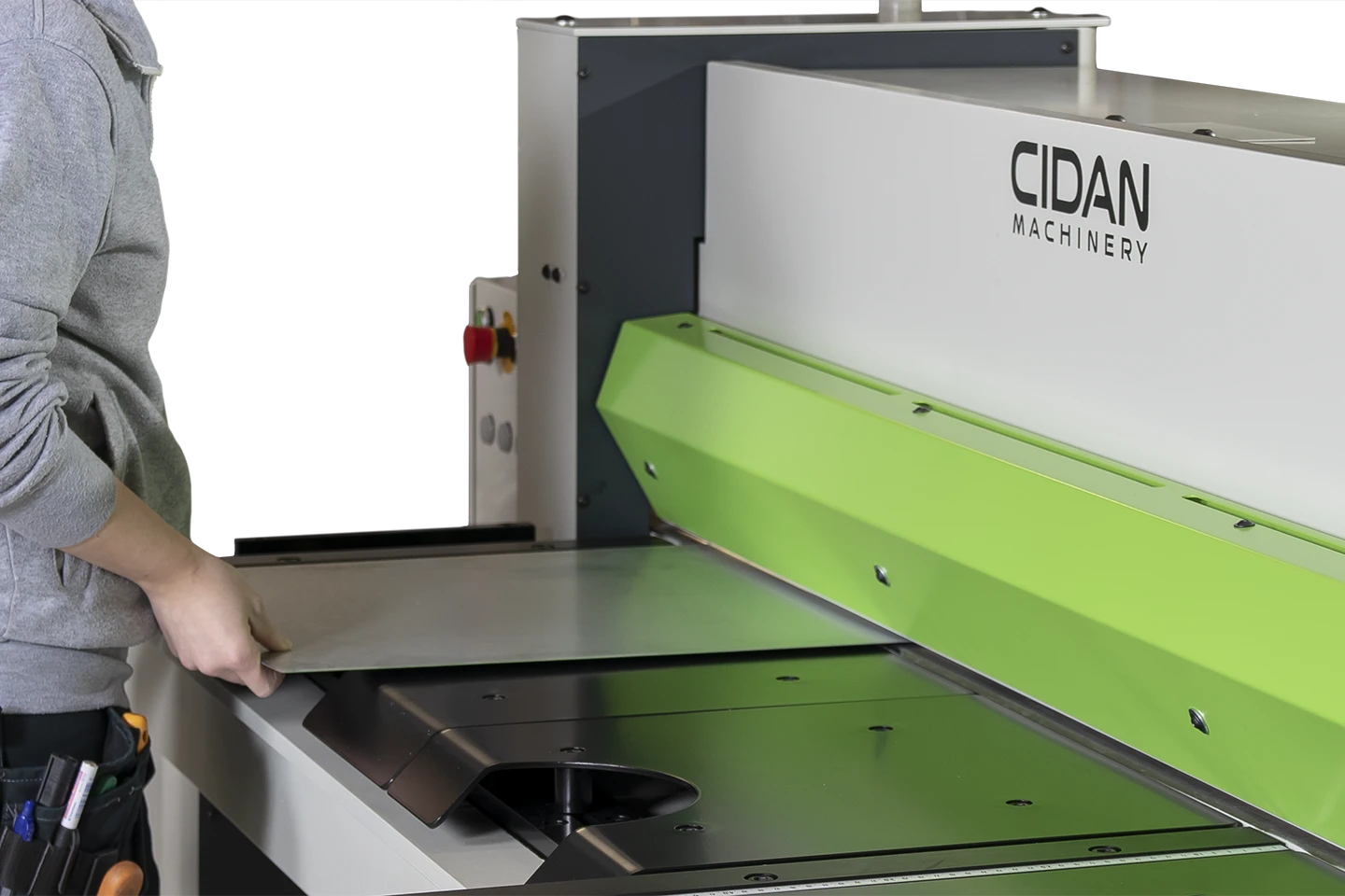 metal shear with pneumatic hold down beam on white background