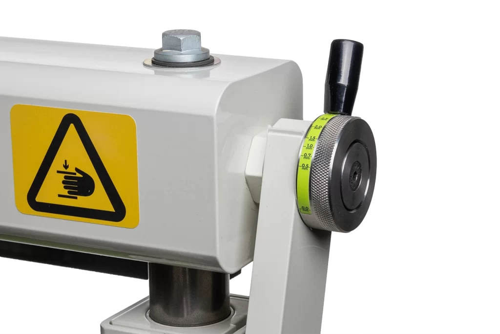 clamping pressure adjustment on manual folder mfb on white background