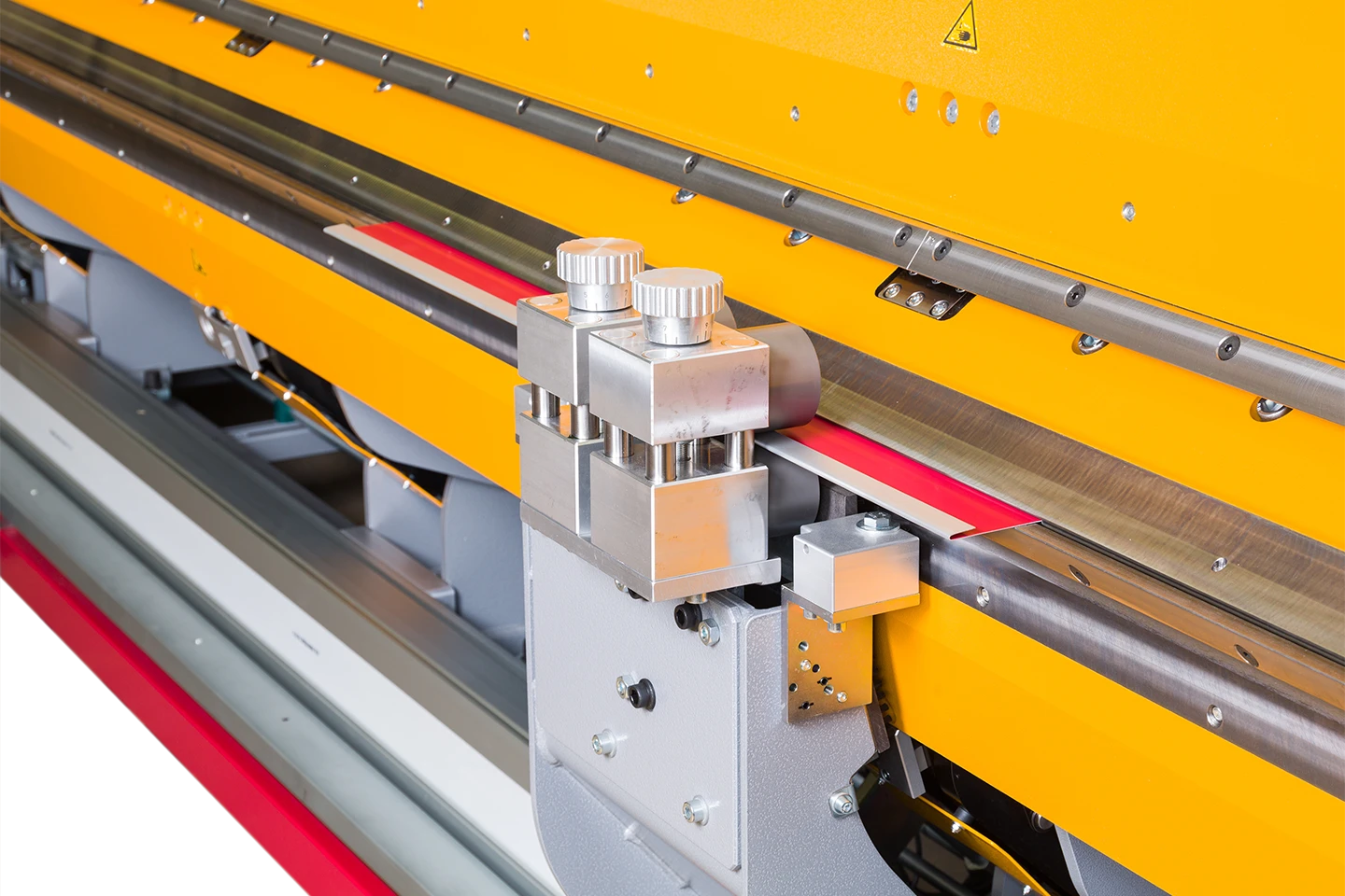 hemming and roll former unit on a thalmann longfolder on white background