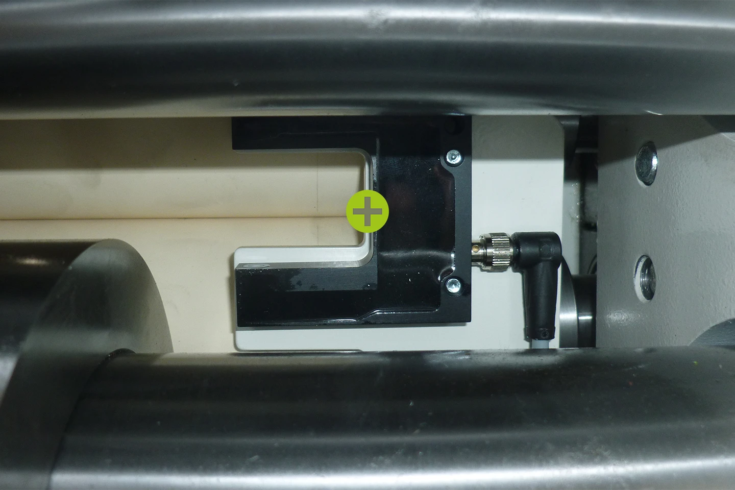 electronic eye measuring the sheet metal in a cut to length machine